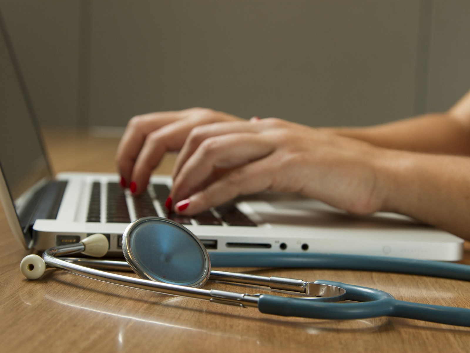 Healthcare professional using a laptop to navigate care decisions